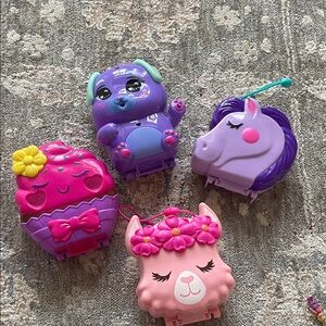 Polly pocket sets (4)